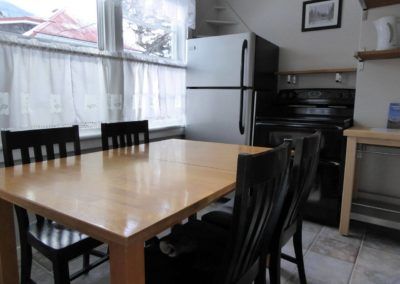 Kitchen and dining area of Moose Cabin in Banff