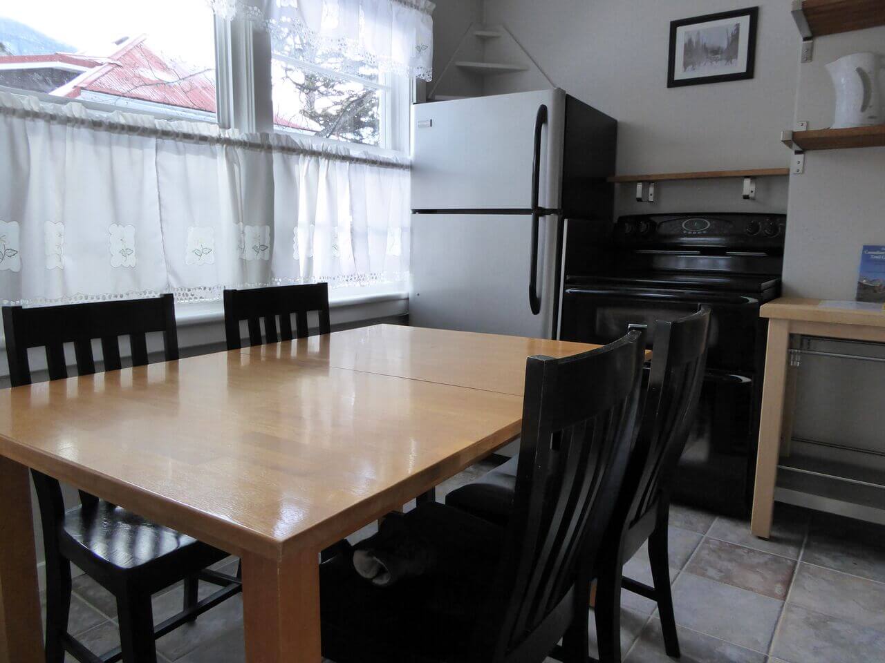 Kitchen and dining area of Moose Cabin in Banff